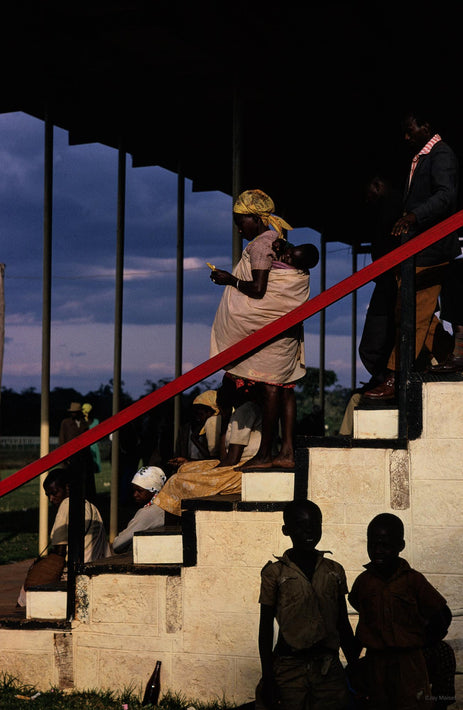 Two Silhouetted Kids Against Steps, Kenya