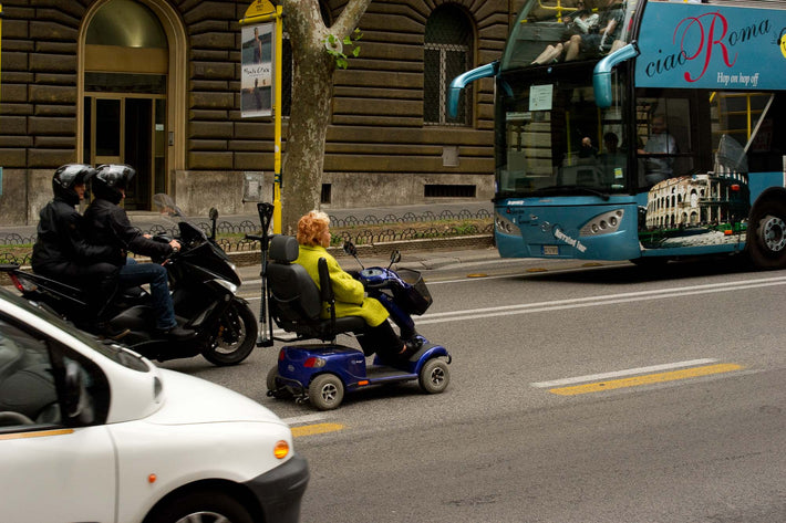 Woman on Scooter in Traffic, Rome