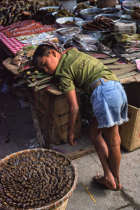 Kid Resting on Table, Bangkok