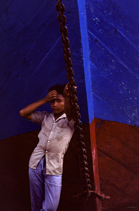 Young Man, Red and Blue Boat, Jakarta