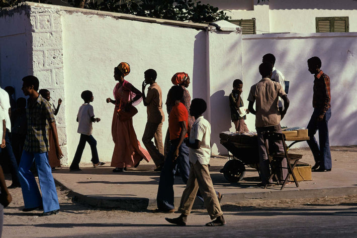 People Walking Against White Wall, Somalia