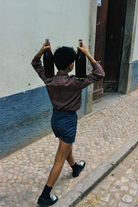 Boy with Two Bottles of Wine, Portugal