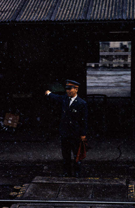 Railroad Conductor in Snow, Japan