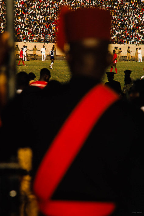 Man with Red Sash Out of Focus, Ghana