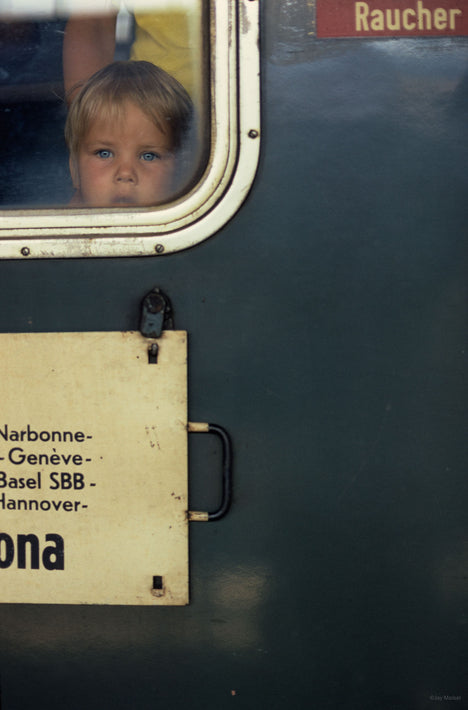 Child in Train Window, Geneva