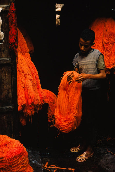 Young Boy with Orange Skeins of Yarn, Marrakech