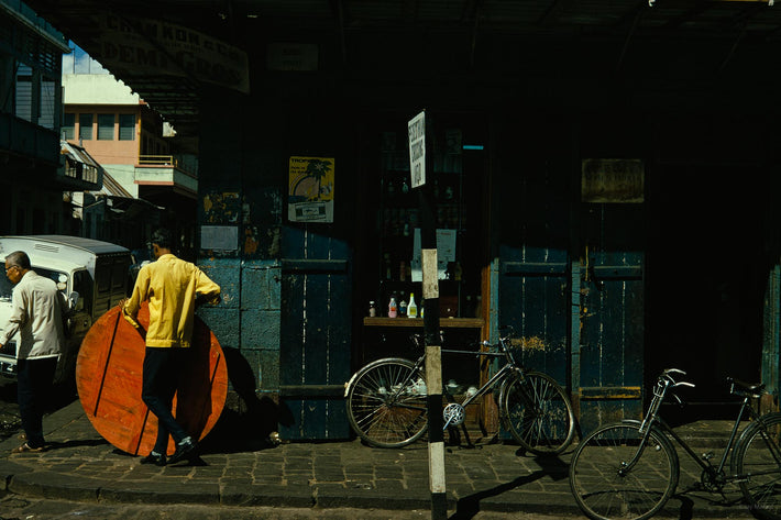 Man in Yellow with Red Table, Mauritius