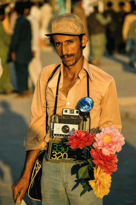 Man, Polaroid Camera, Flowers, Abu Dhabi