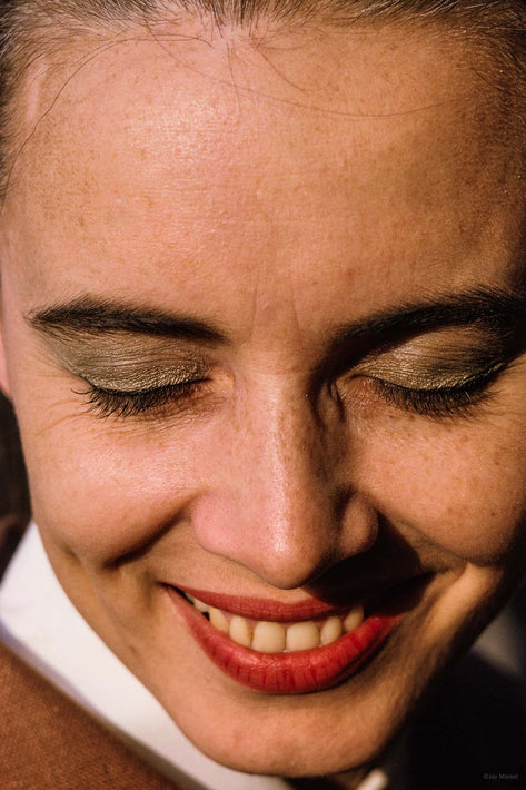 Smiling Woman Looking Down, London