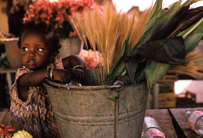 Child with Flowers in Bucket, Senegal