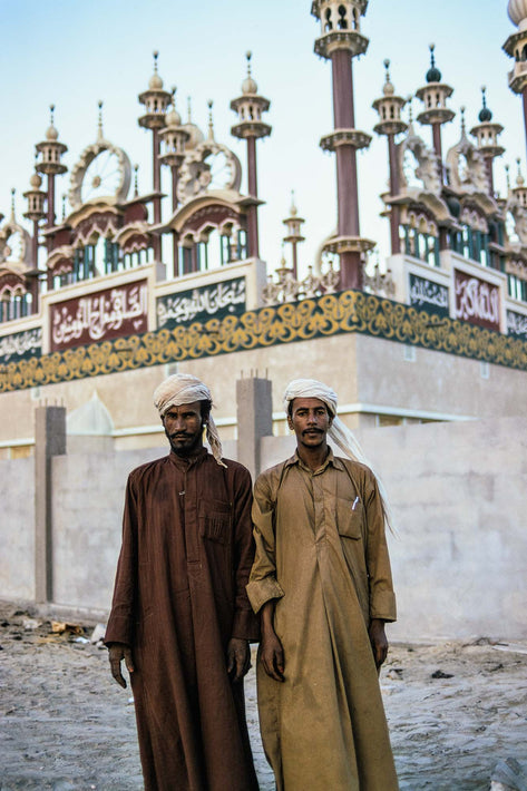 Two Men Posing, Baroque Tower, Abu Dhabi