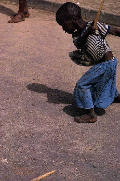 Kid, Striped Shirt, Swinging Stick, Ghana