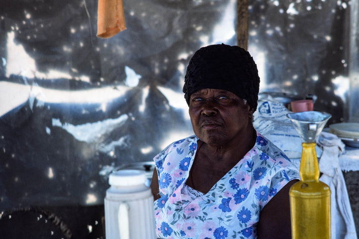 Woman in Blue with Yellow Container, Bahia