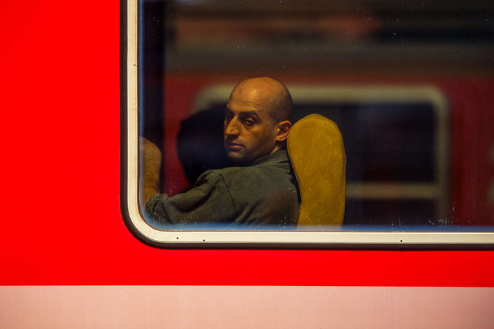 Bald Man in Train Window, Milan