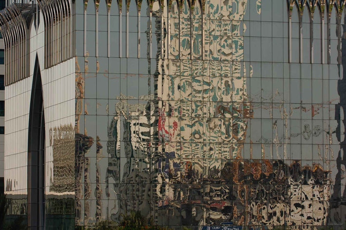 Reflection in Glass Building with Arch on Right, Dubai