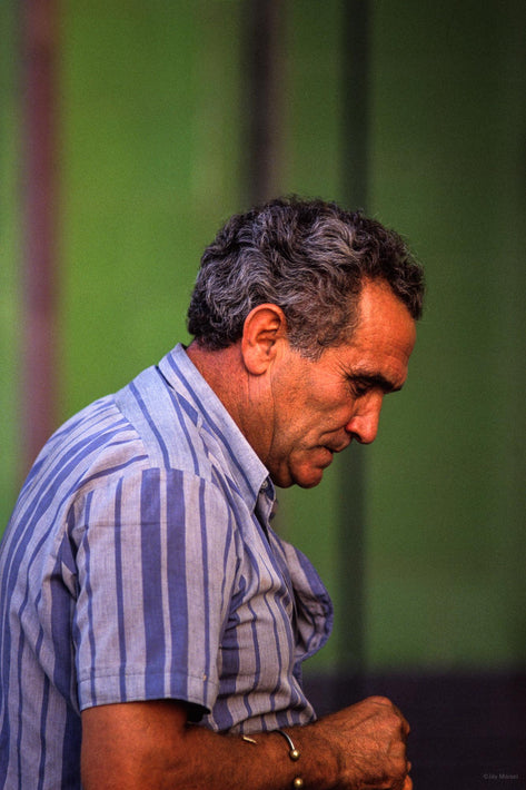 Profile of Man Against Green, Spain