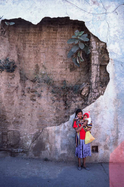 Woman and Baby Against Fragmented Wall, Oaxaca