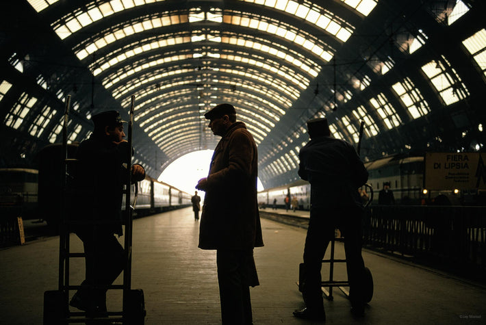 Figures Silhouetted at Train Station, Milan