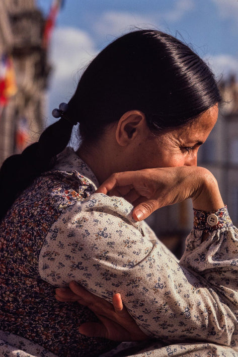 Profile of Woman with Hand on Shoulder, France