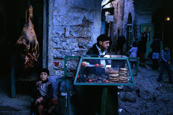 Man, Child and Hanging Beef, Jerusalem