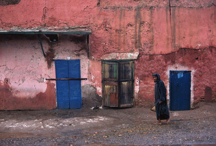 Man in Dark Djellaba with Blue Doors and Pink Walls, Marrakech