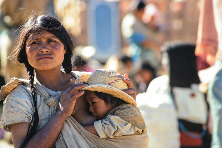 Child in Hat Nursing, San Cristobal