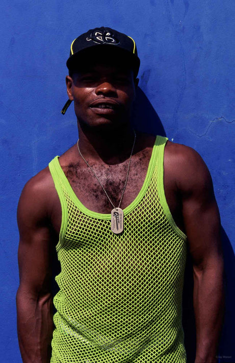 Man in Yellow, Blue Wall, Jamaica