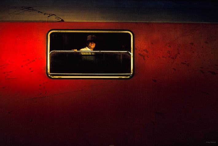 Red Car and Man in White, Geneva