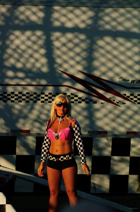 Girl in Pink and Checkers Posing at Fair, Maine