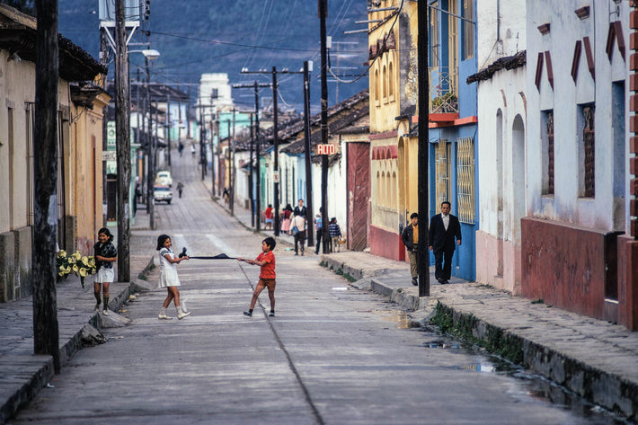 Two Fighting Over Fabric, San Cristobal