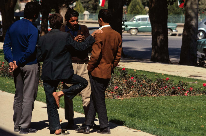 Four Men, One with Bare Foot on Knee, Iran