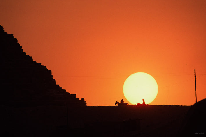 One side of Pyramid with Sun, Two Horses, Egypt