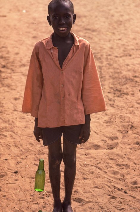 Boy with Green Bottle, Senegal