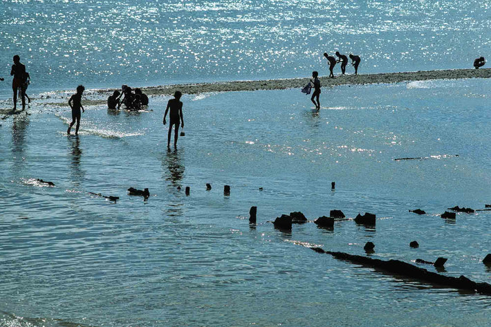 Kids Silhouetted Against Aqua Background, Three Leaning in Unison, Bahia