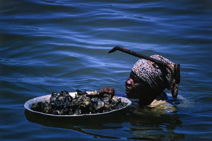 Woman in Water, Crowbar on Head, Ghana