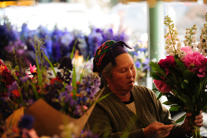 Older Woman with Flowers, Seattle