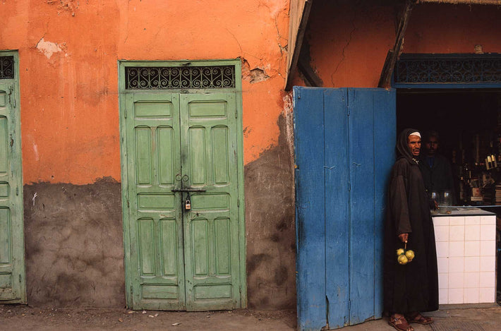 Facade with Man and Yellow Fruit, Marrakech