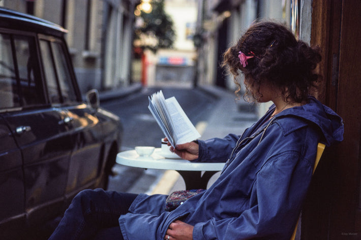 Woman Reading at Table, France