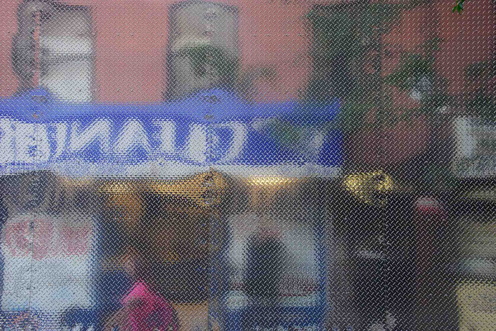 Reflection in Diamond Plate Truck, NYC