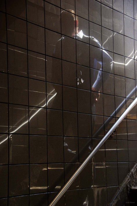 Man Reflected in Subway Tiles, NYC
