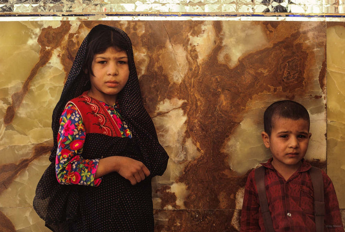 Boy and Girl Against Onyx Wall, Iran