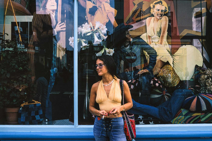 Woman in front of Marilyn Monroe Pictures, London