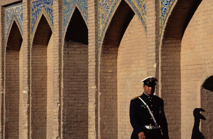 Policeman on Bridge with Bizarre Shadow, Iran