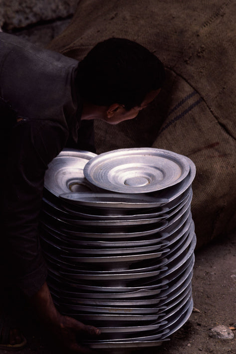 Boy with Piles of Trays, Egypt