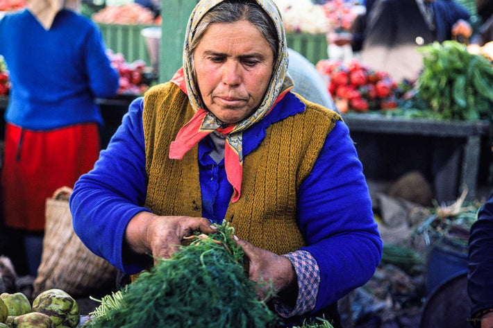 Woman at Market with Greens, Romania