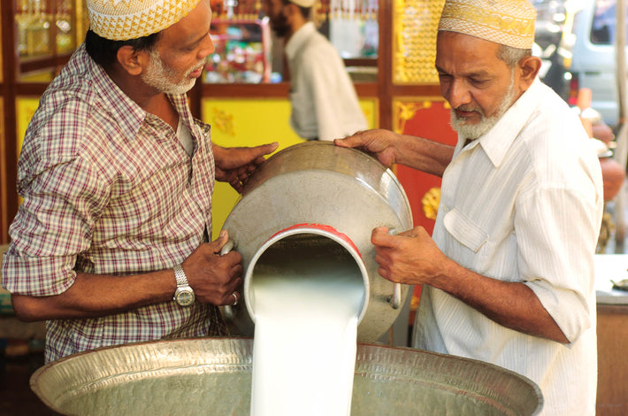 Two Men Pouring Milk, Mumbai