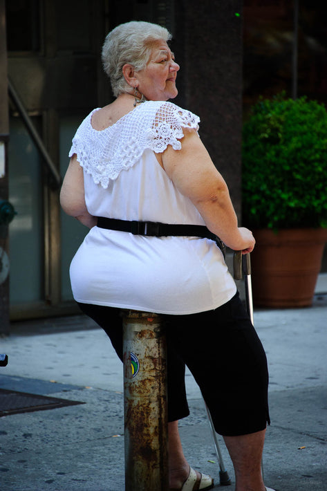 Woman Sitting on Pipe, NYC