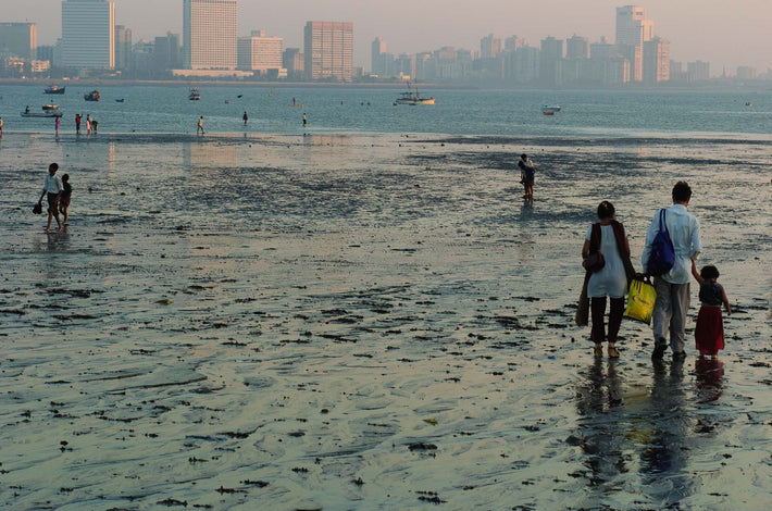 Family Walking on Muddy Beach, Mumbai