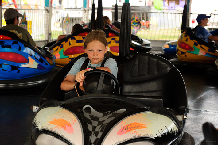 Determined Young Girl on Ride, Maine