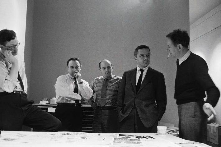 Herbert Matter (far right), Paul Rand (second right), Lou Dorfsman (far left), and two unknown, 1956